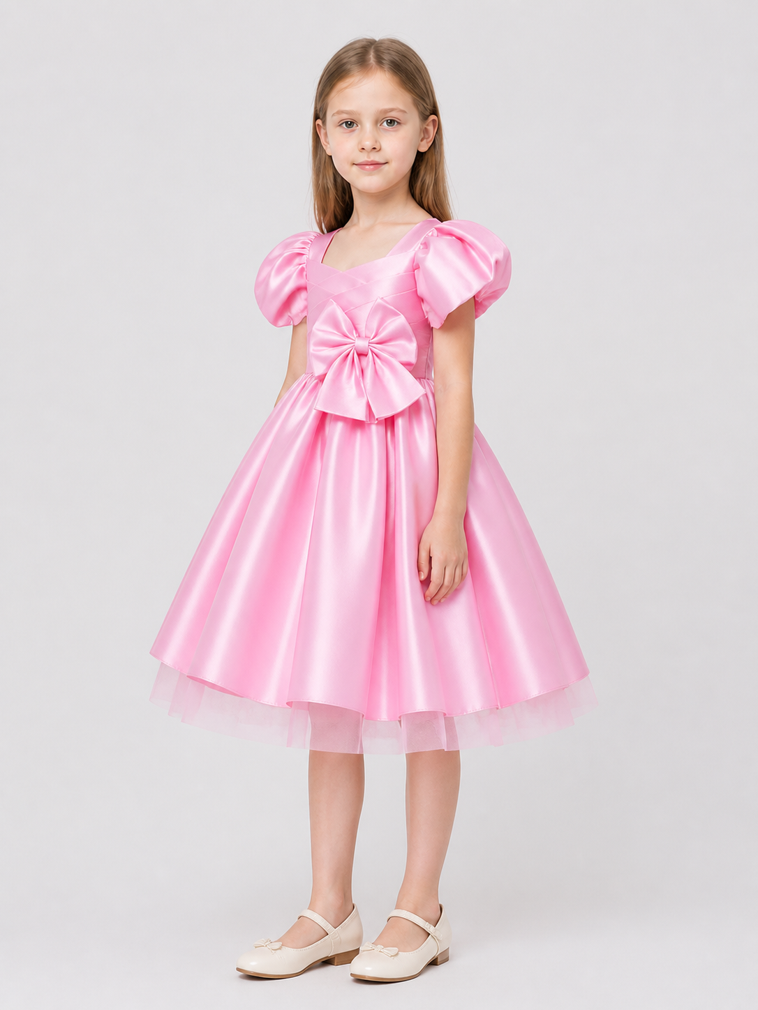 Children’s princess dress with a full skirt and large bow side view