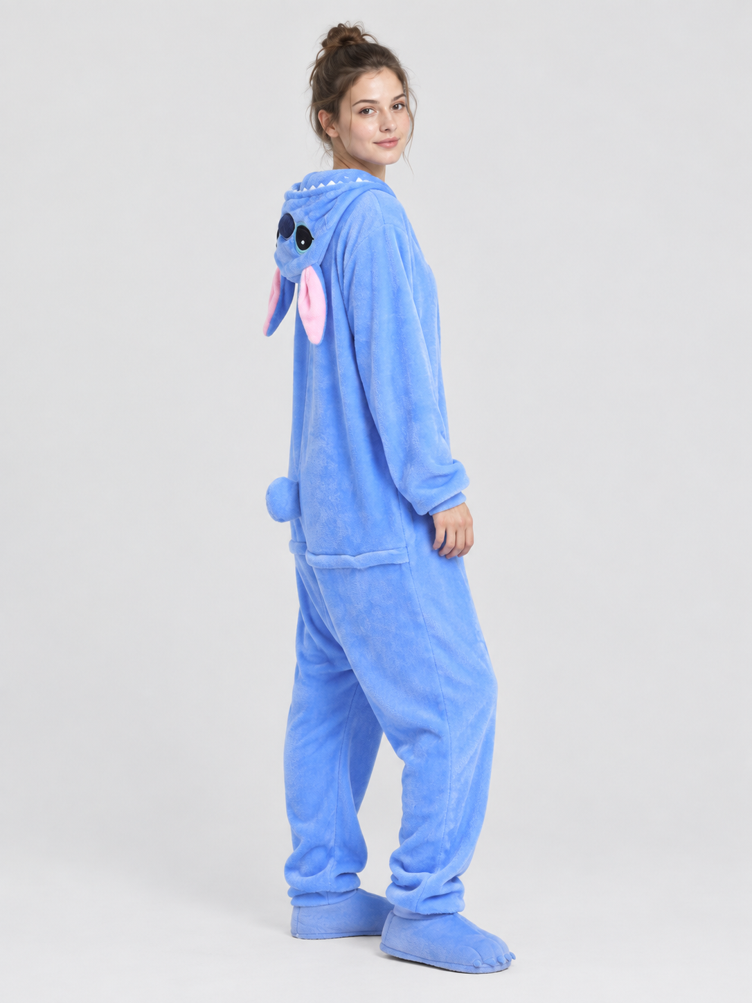 Blue pajama jumpsuit with a hood, ears, and tail