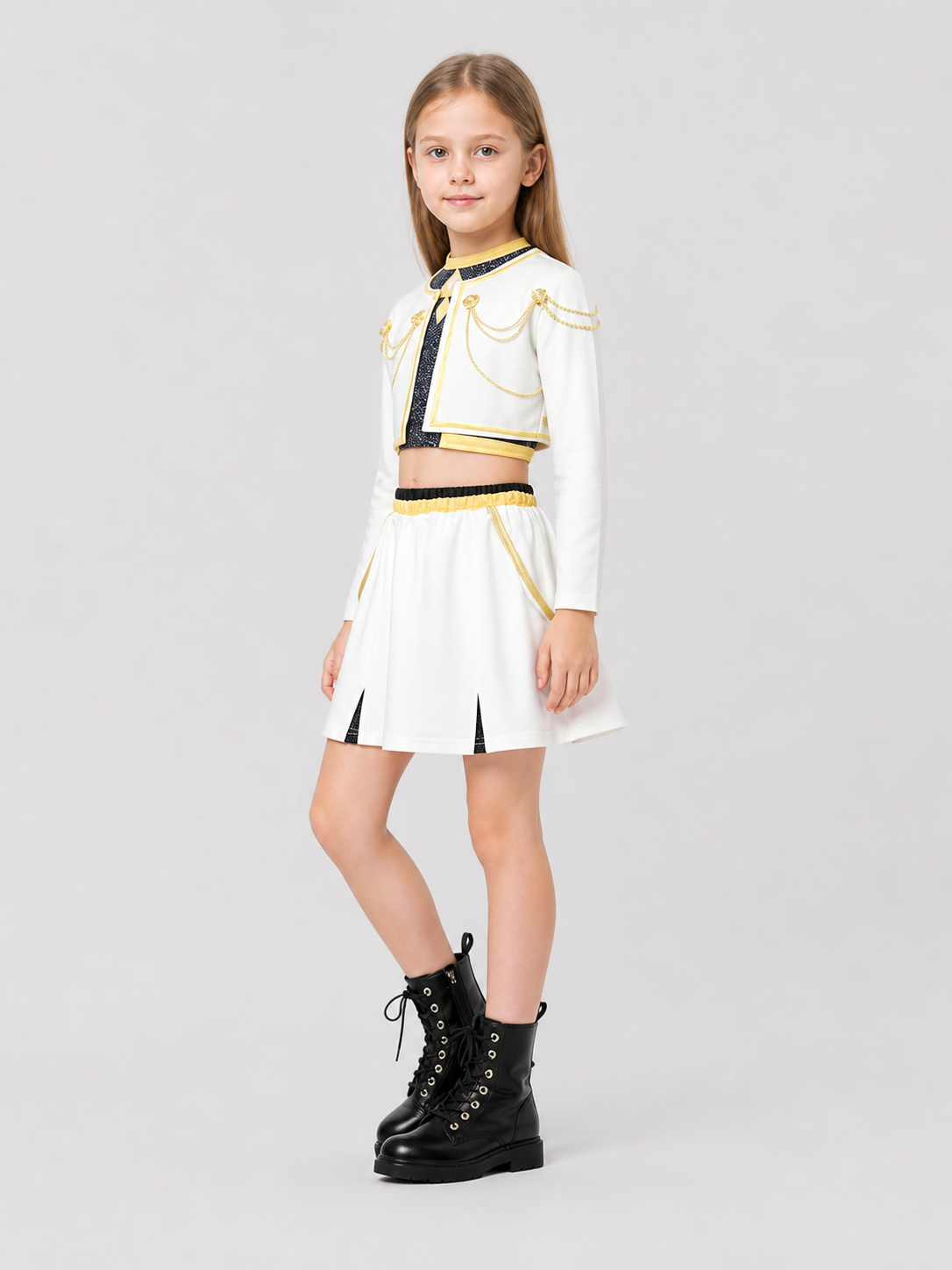 Children’s stage costume, white, black, and gold, 3 pieces side view