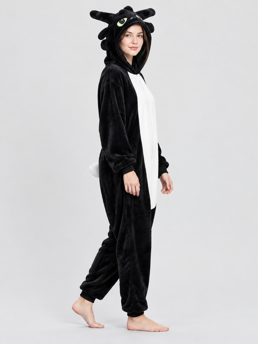Black and white pajama jumpsuit with a hood and ears