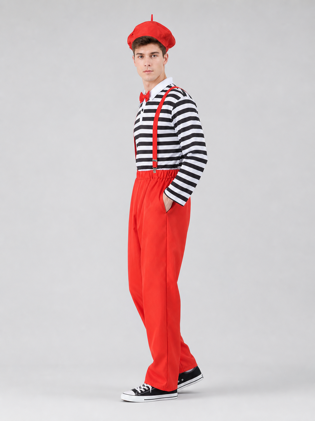This bright clown costume is designed to create an expressive stage look and a festive transformation. The set includes a red cap with a short protruding crown, round glasses with red frames, a long-sleeve shirt with horizontal black-and-wh