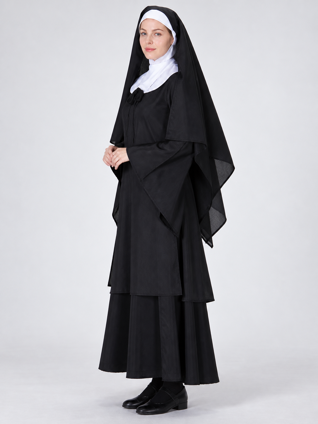 Long black and white costume with headpiece and veil