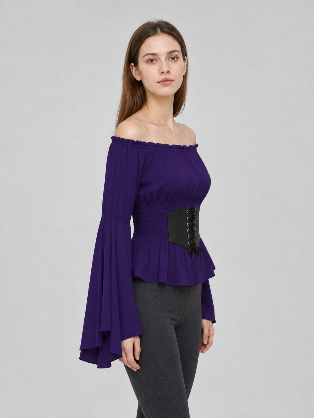 Purple blouse with a tie belt, off-the-shoulder neckline, and flared sleeves