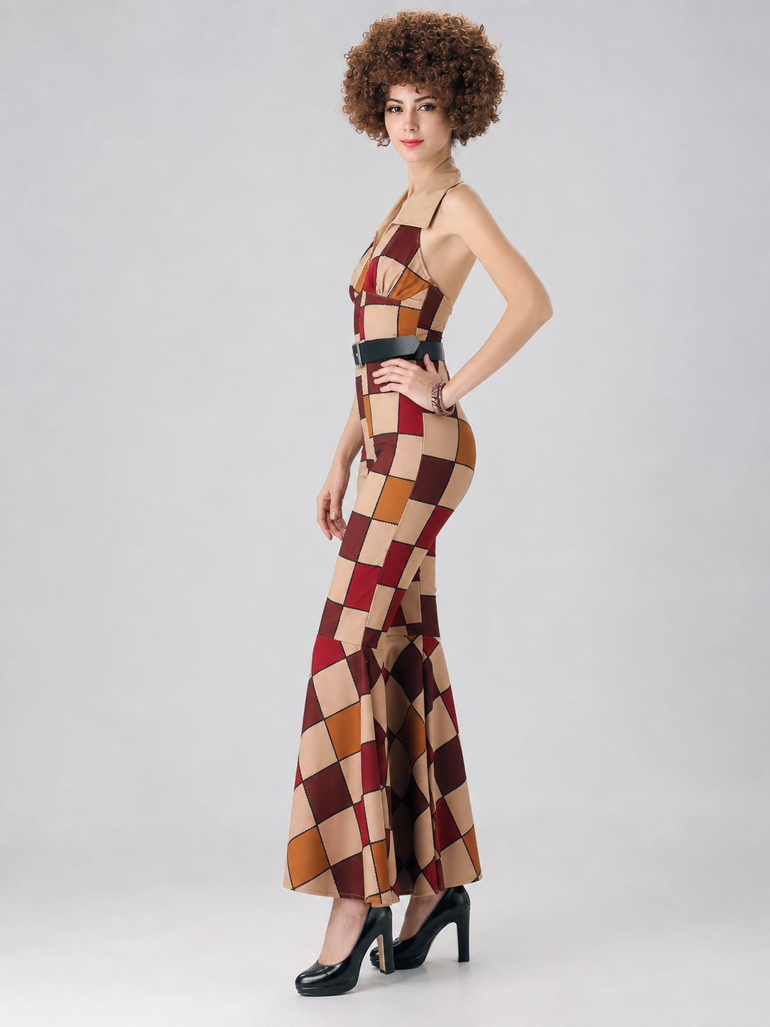 One-piece jumpsuit costume for themed looks and parties with a striking design. The model features a single silhouette that combines a top and pants. The strapless top with an open waistline is connected to high-rise pants, while the lower 