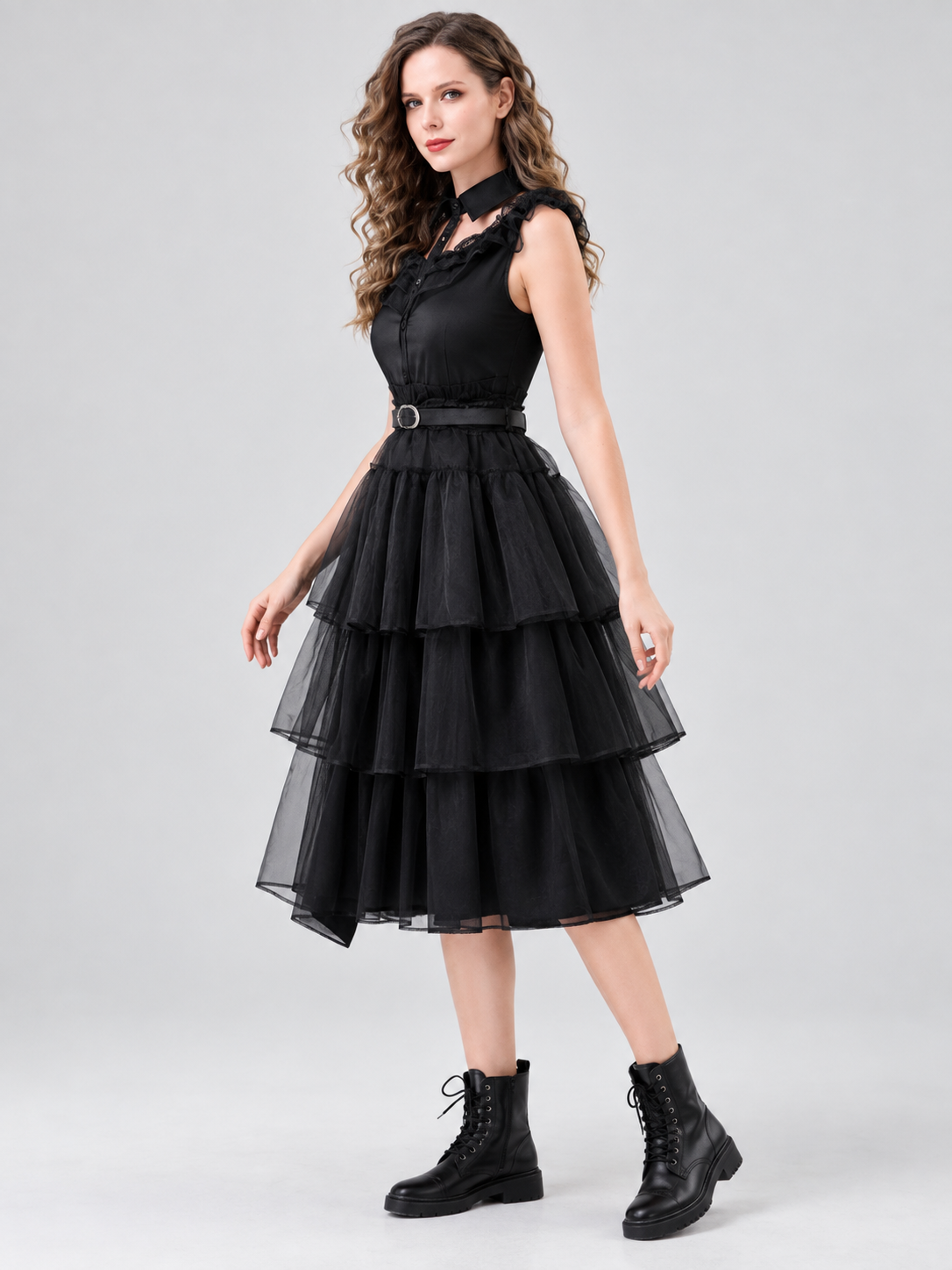 Black sleeveless dress with ruffles and a tiered skirt