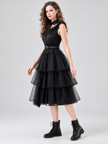 Black sleeveless dress with ruffles and a tiered skirt