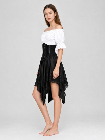 The set is designed in a theatrical pirate style and consists of a white cropped off-the-shoulder top with voluminous puff sleeves, a black corset with front lacing and metal eyelets, and a black asymmetrical skirt with elongated pointed pa