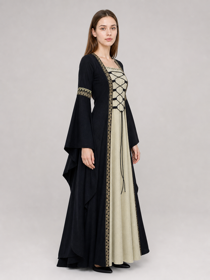 Medieval-style dress with flared sleeves, lacing, and decorative trim. The design is made in black with a cream-colored center panel and golden floral elements along the edges and on the cuffs. The open front layer frames the light-colored 