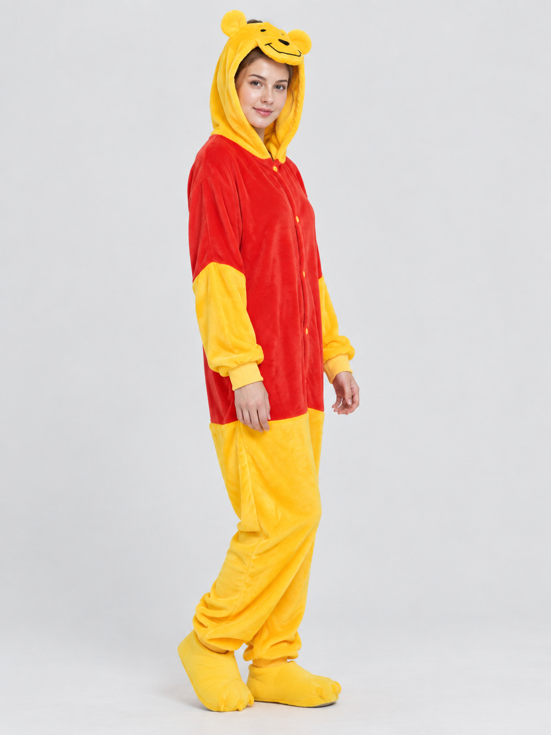 Red and yellow pajama jumpsuit with bear ears