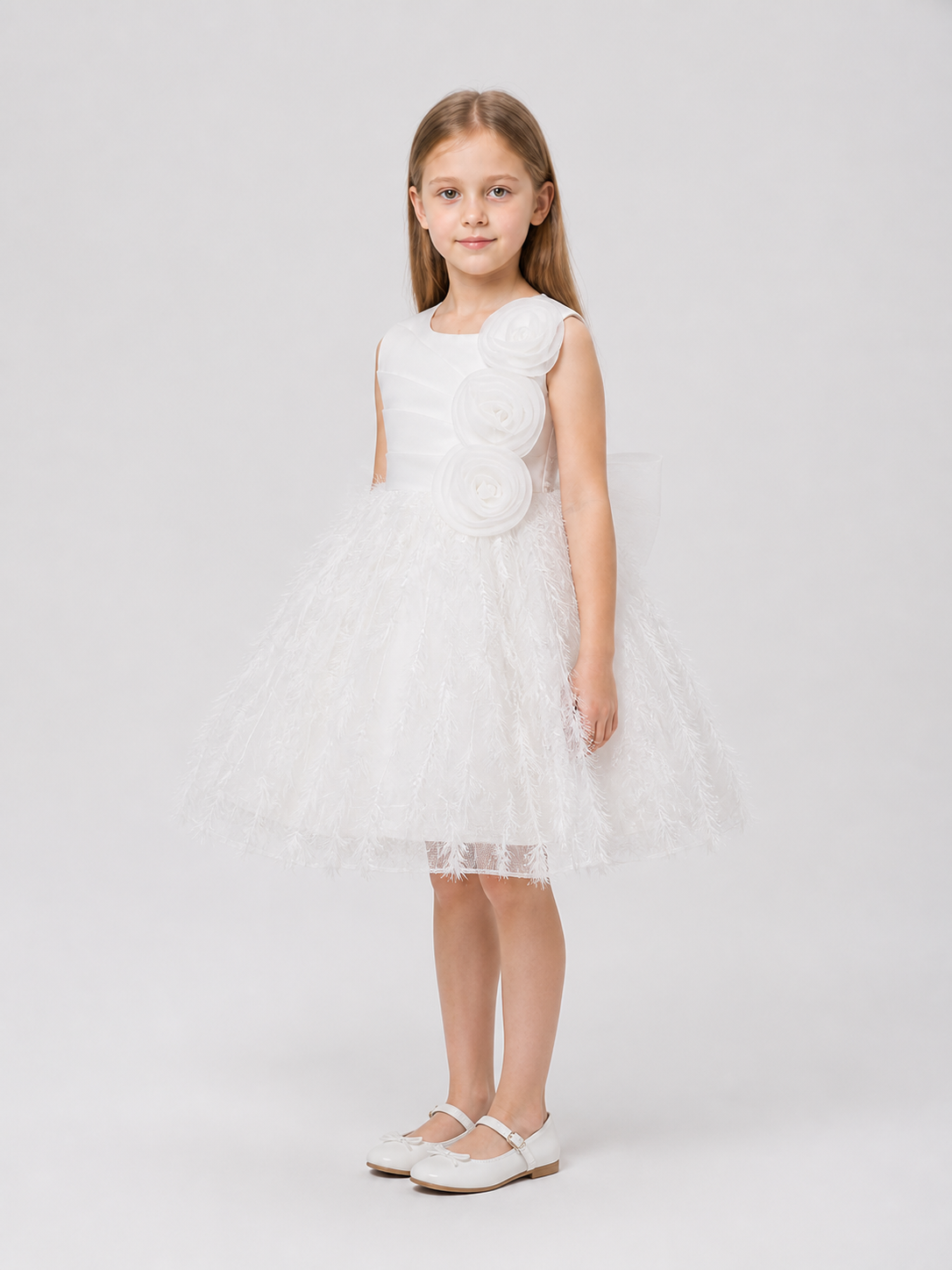 White Formal Dress with a Full Tulle Skirt and Roses