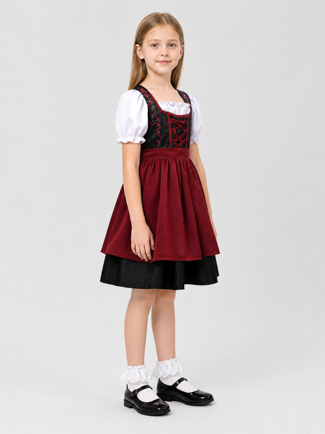 Children’s ethnic dress with a bodice and puff sleeves side view