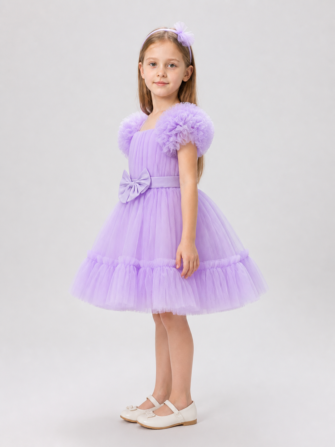Festive Tulle Dress with a Full Skirt and Bow side view