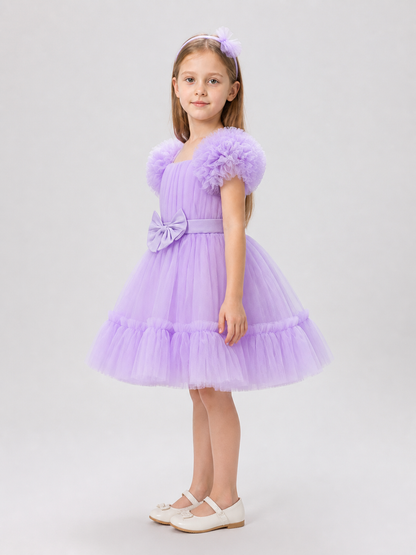 Festive Tulle Dress with a Full Skirt and Bow side view