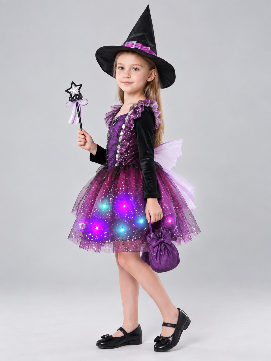 Kids' witch carnival costume with a glowing skirt