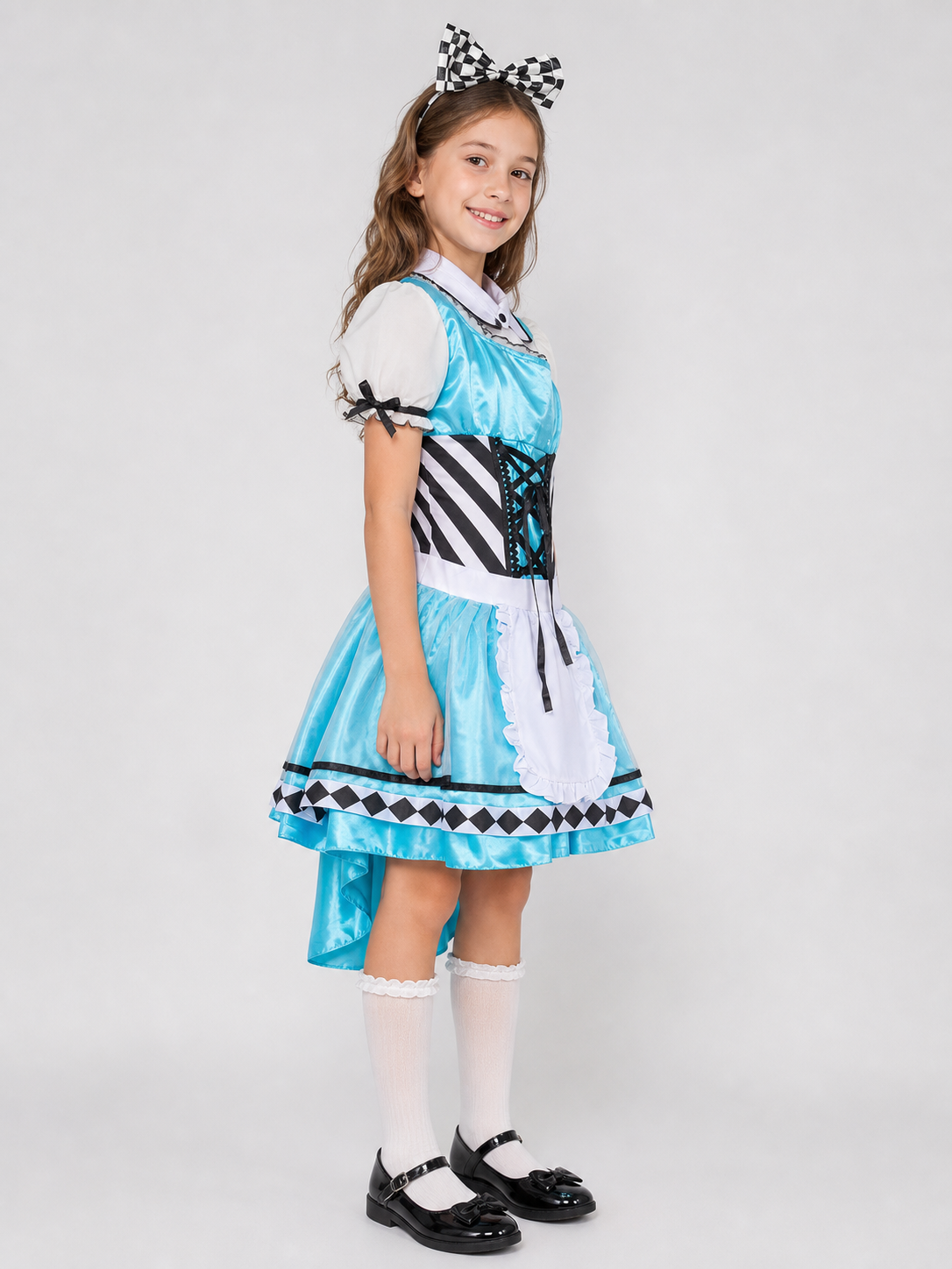 The set is designed as a cosplay dress with decorative princess-style details and includes a dress, a separate collar accessory, and a headband with a bow. The look is centered around a light blue dress with a full, layered skirt and a whit