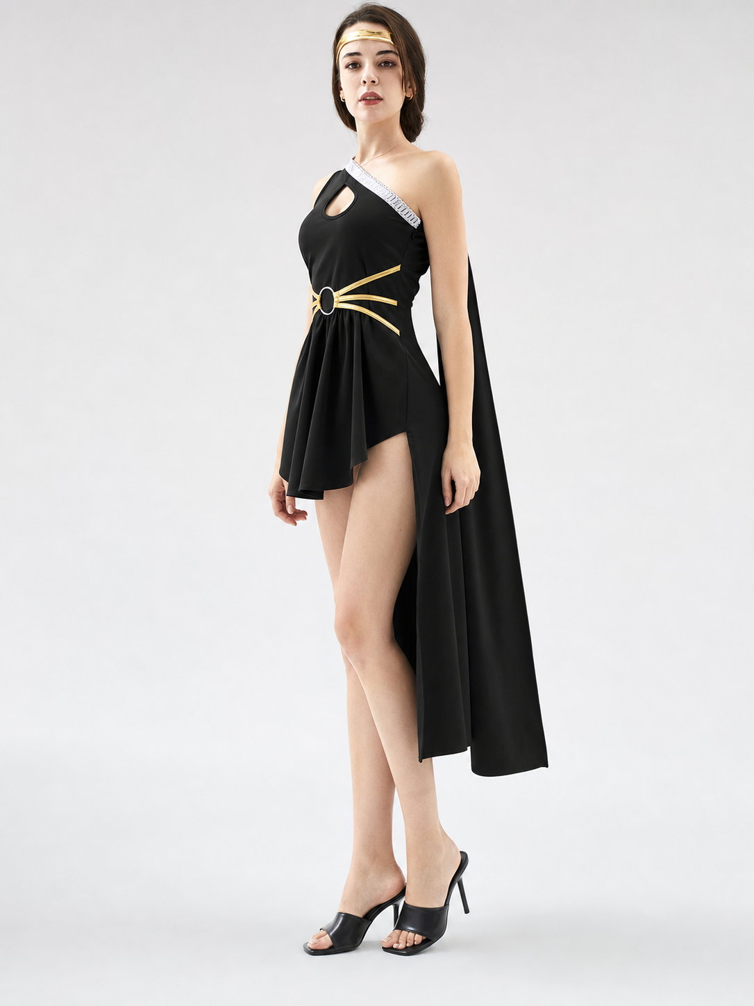 Stage costume with cape and gold-colored embellishments