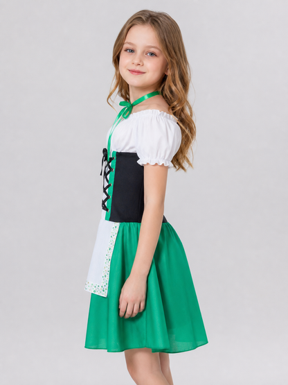 The dress is designed in a combination of white, green, and black. The silhouette emphasizes the waist and features a flared skirt. The design is finished with voluminous white short sleeves, a green tie collar, and green polka-dot trim. Th