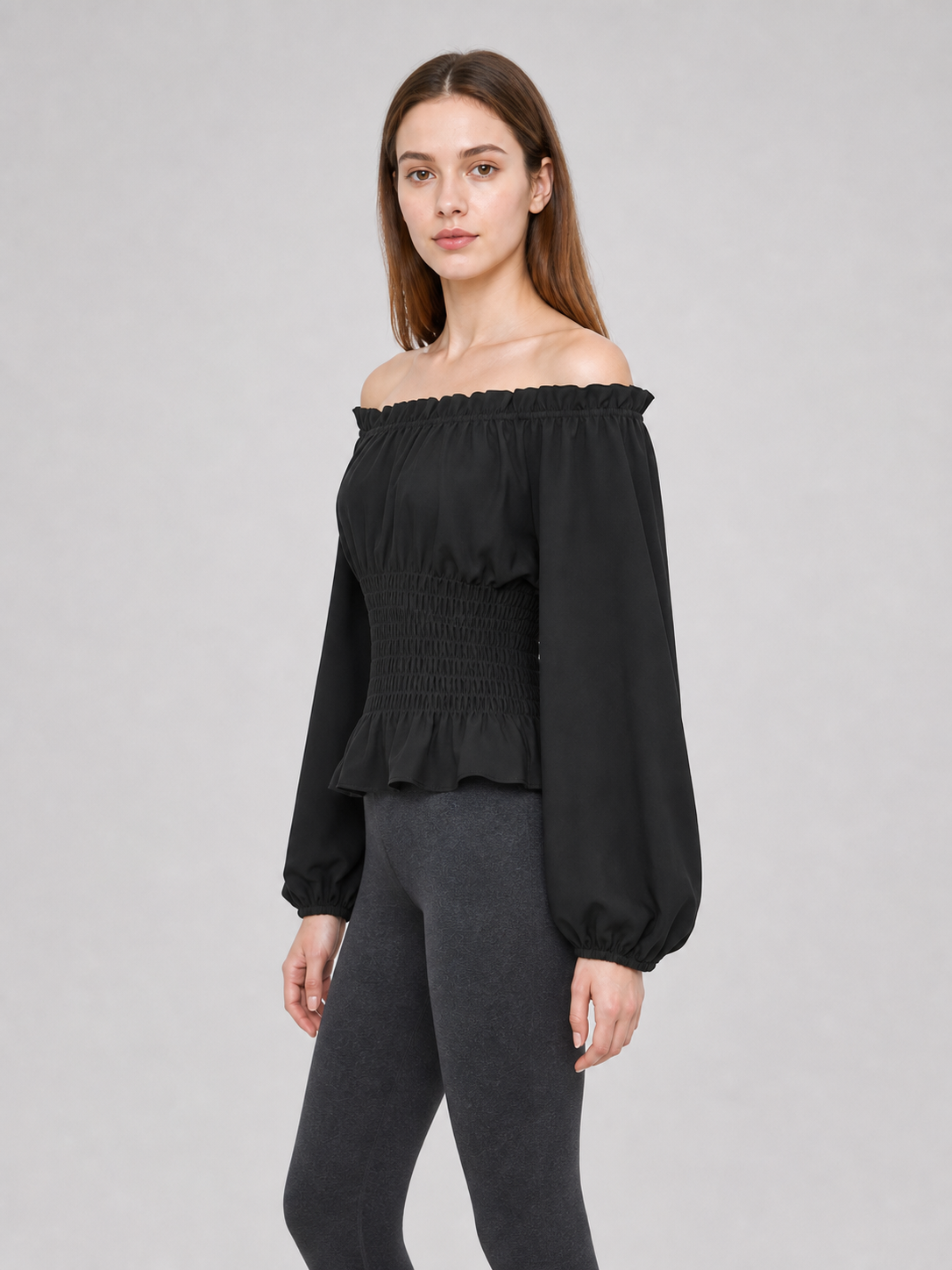 Black off-the-shoulder blouse with ruffles
