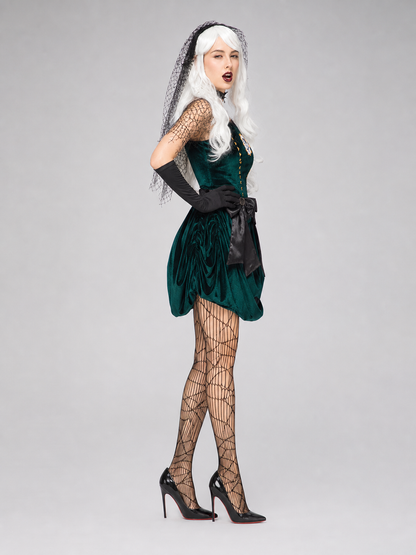The gothic stage look is designed in deep green with a white pattern and black details. The main piece is a sleeveless dress with a fitted bodice and a short, full skirt silhouette. A circular design featuring a character profile is placed 