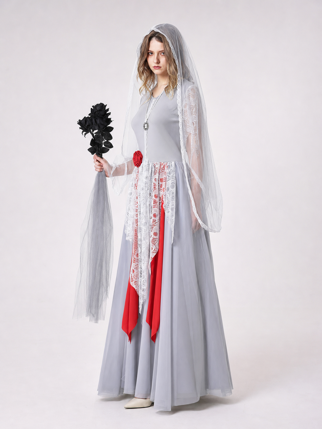 Gothic vampire costume with veil and lace dress