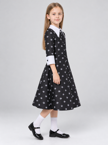 Children's costume dress with a white bow print side view