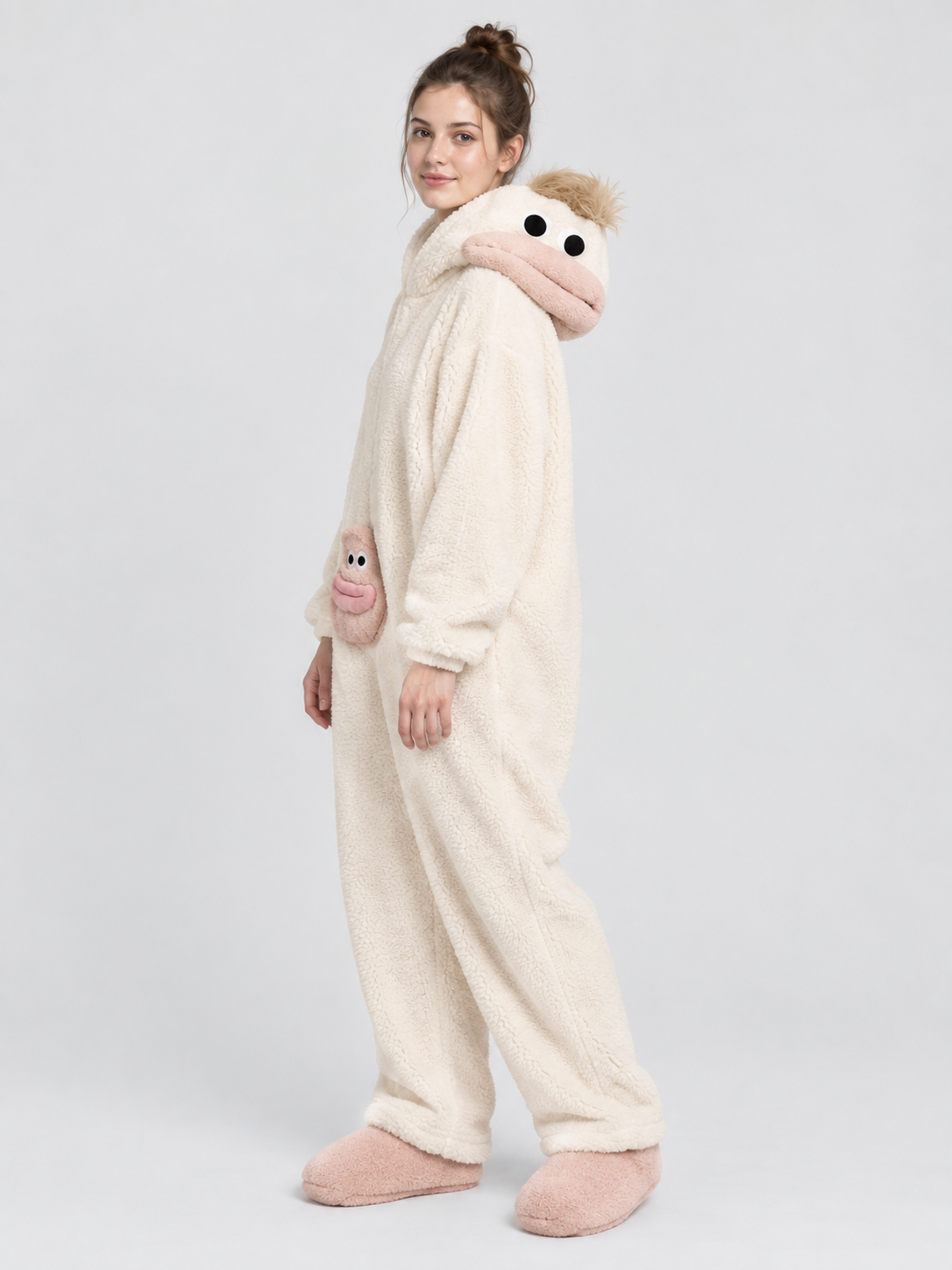 Pajama jumpsuit with a bulky hood and a cartoon face