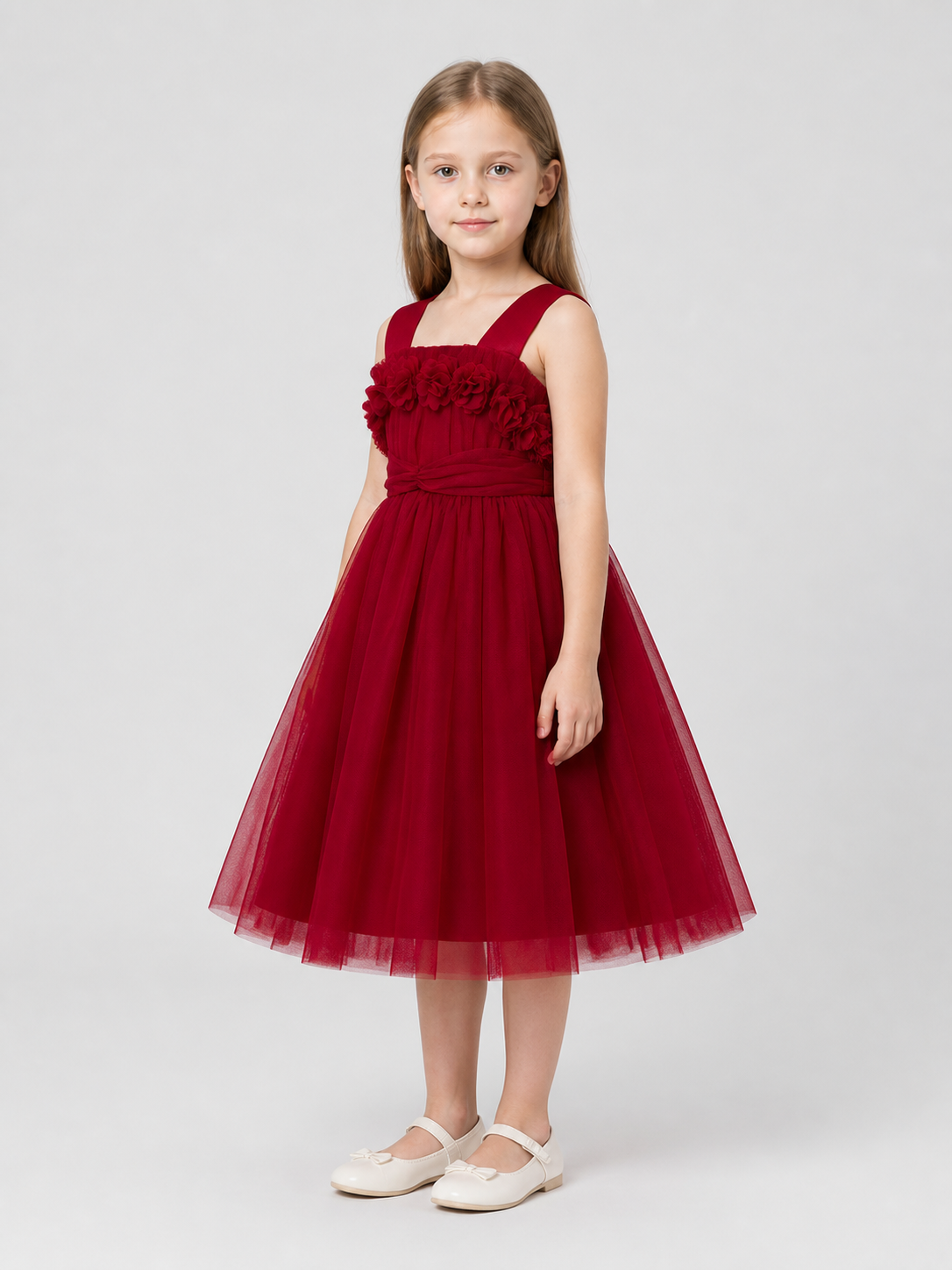 Children’s dressy dress with shoulder straps and a full skirt side view