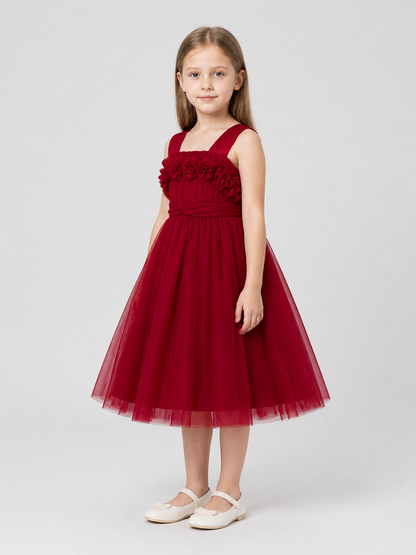 Children’s dressy dress with shoulder straps and a full skirt side view