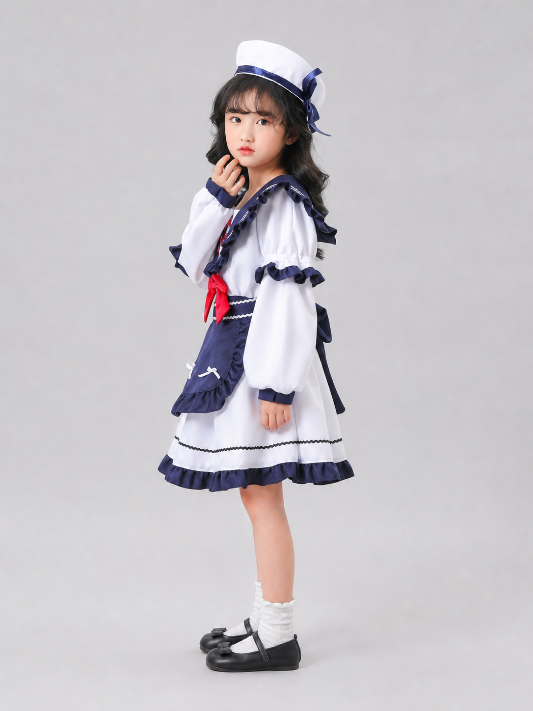 Nautical-style stage costume with bows
