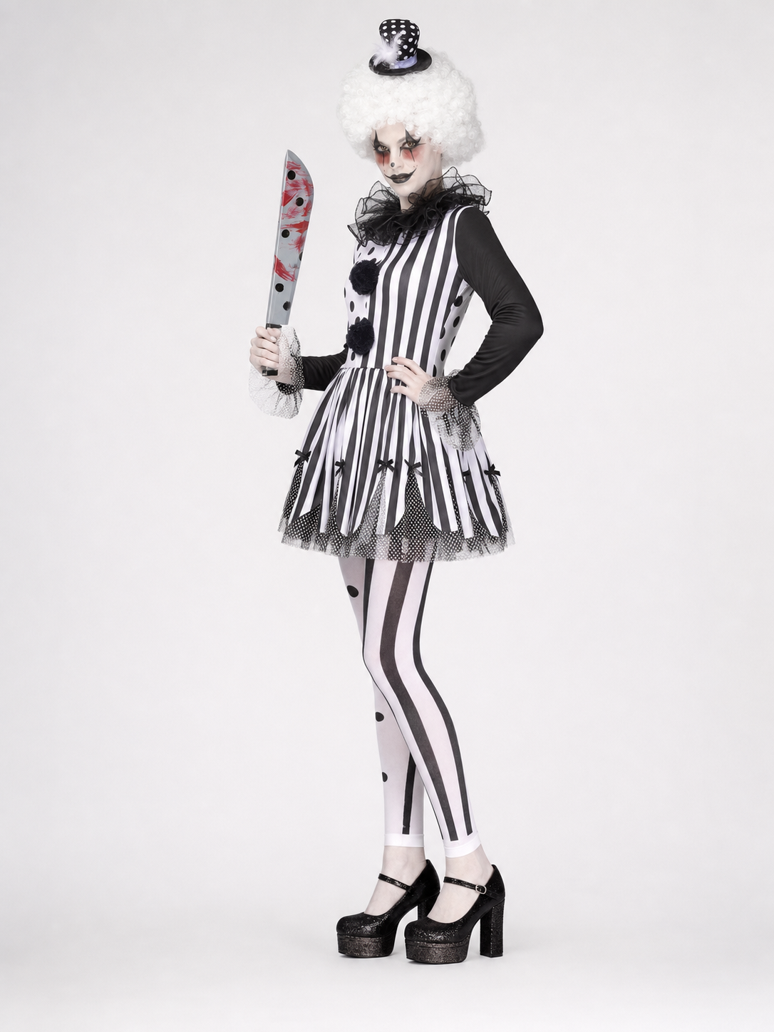 Black-and-white clown costume with a full skirt and decorative details for a Halloween look, themed party, or cosplay. The design is inspired by a circus clown: the top combines contrasting areas with black dots and vertical stripes, while 