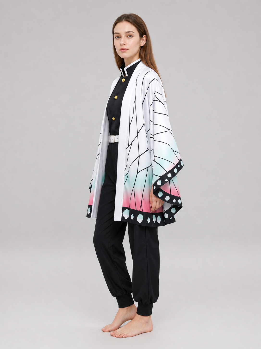 The set is designed in anime cosplay style and includes several pieces for creating a striking look. The main piece is a long white cloak with wide, loose-flowing sleeves. A graphic black pattern runs across the cloak, resembling branches o