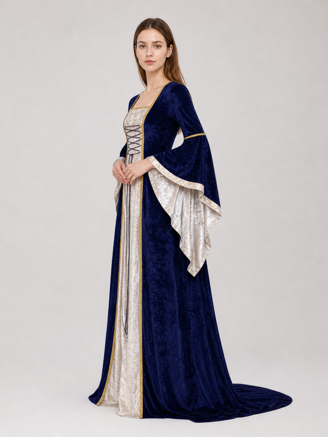 Gothic medieval-style dress made of textile fabric, featuring a floor-length design with a full skirt and flared sleeves. The sleeves are accented with tiered ruffles that emphasize the costume’s historical character. The main color is deep