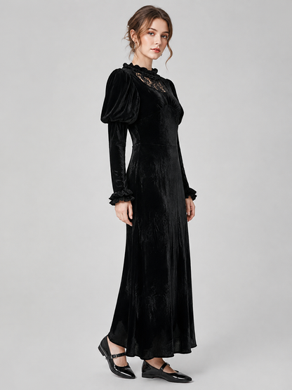 Long black corduroy dress with puff sleeves side view