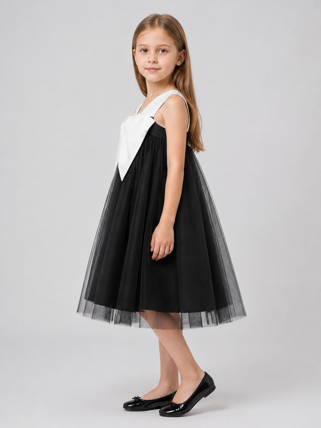Children’s Costume Dress with a Voluminous White Bow side view