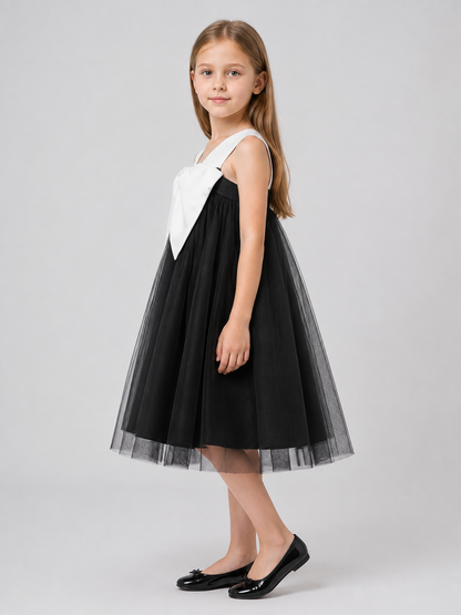 Children’s Costume Dress with a Voluminous White Bow side view
