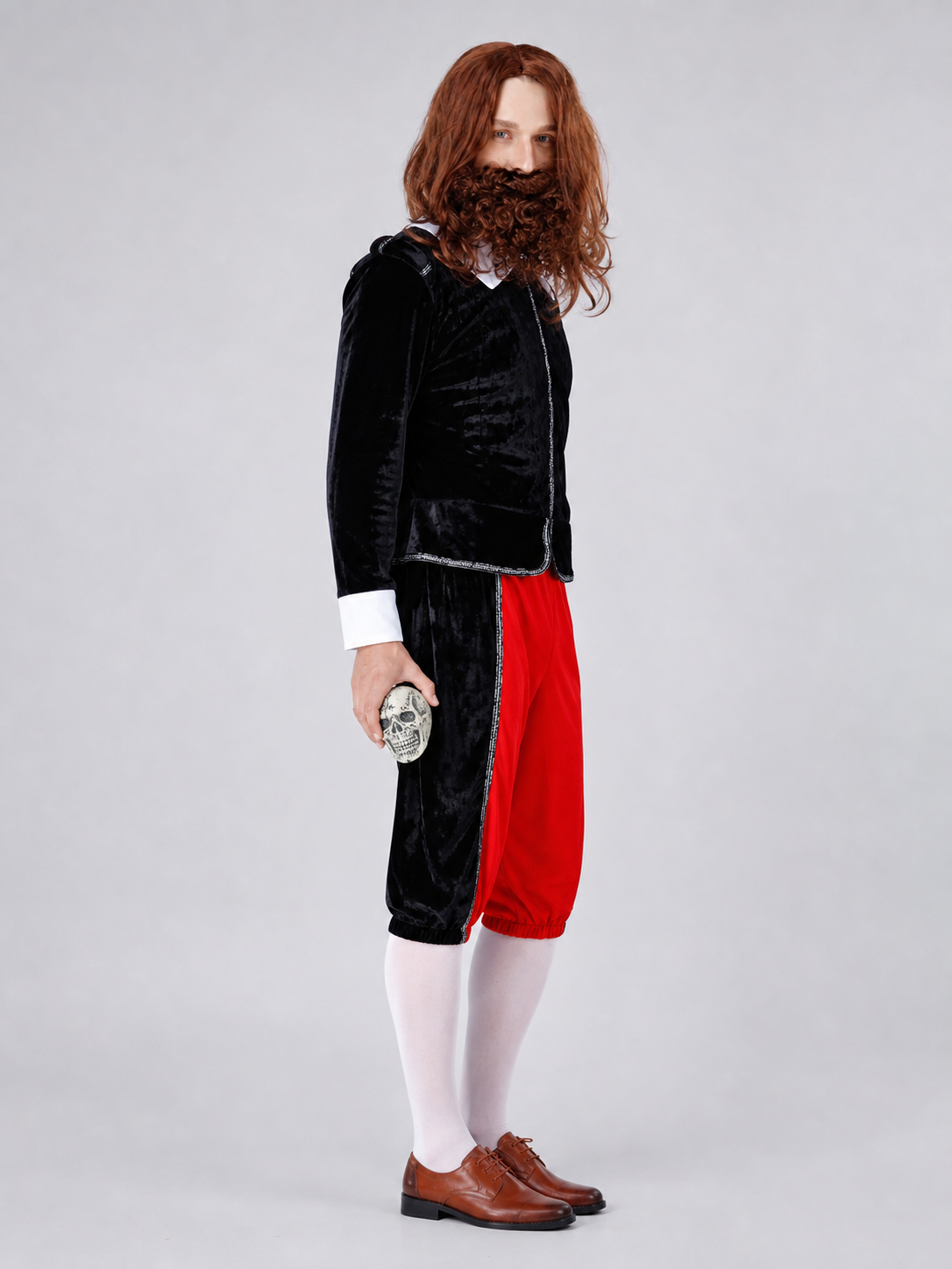 The vampire costume features a combination of black, red, and silver colors. The set includes a black long coat with long sleeves and red pants, combined to create a themed outfit. The front of the coat has a zipper running down the center.