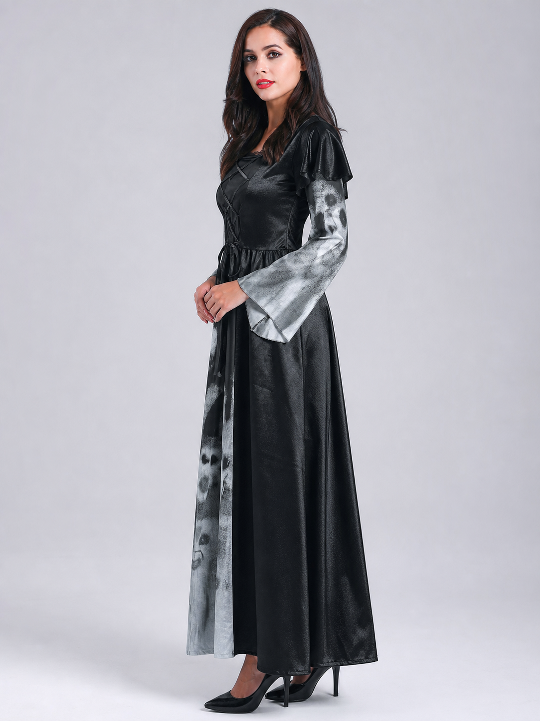 This costume dress for a Halloween look is designed in a gray-and-black color scheme. The dress features a distinctive ghost-face pattern positioned on the lower and middle sections of the garment, complemented by fabric inserts with a gray