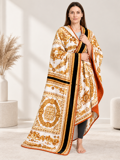 Soft throw blanket with a white-and-gold pattern and black stripe