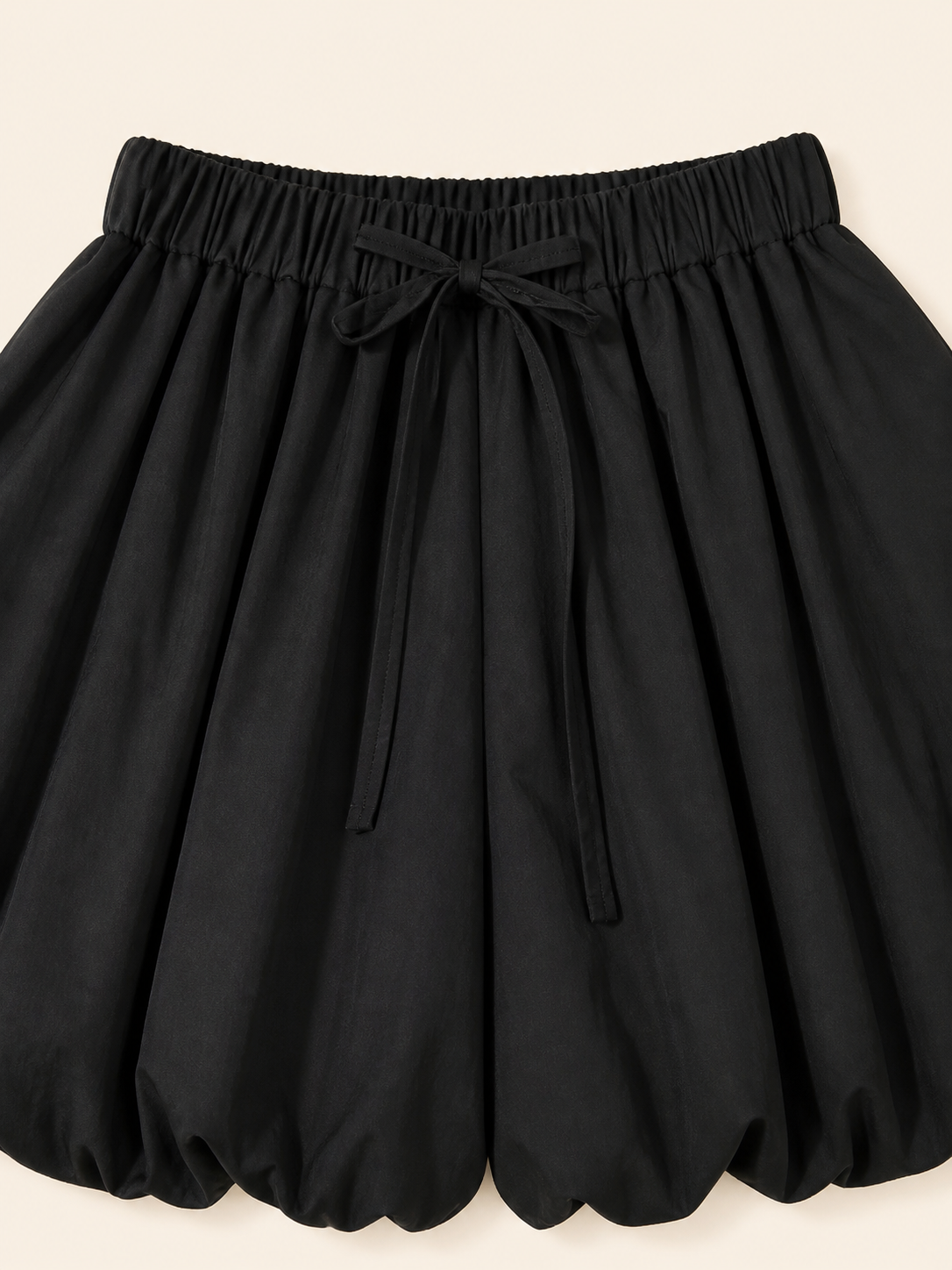 Mini skirt with a high elastic waistband and a full silhouette