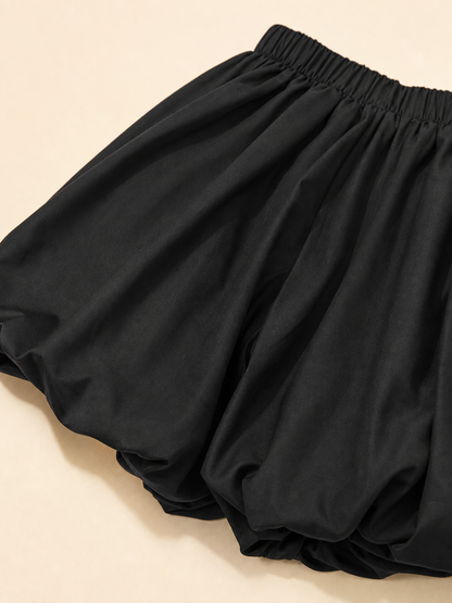 Mini skirt with a high elastic waistband and a full silhouette
