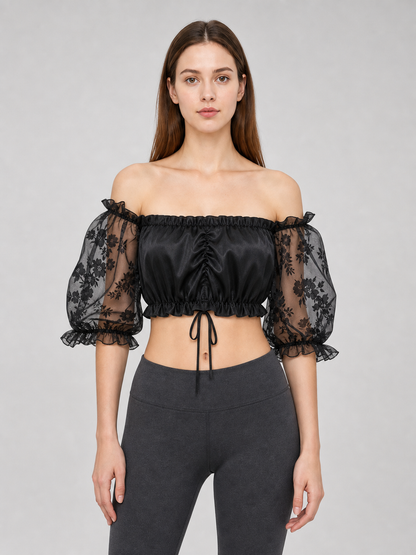 The blouse is black: the main body is made of opaque, smooth fabric