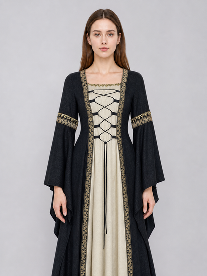 Medieval-style dress with flared sleeves, lacing, and decorative trim. The design is made in black with a cream-colored center panel and golden floral elements along the edges and on the cuffs. The open front layer frames the light-colored 