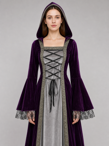 The dress is designed in a Gothic medieval style and features a costume design in deep purple with silver-gray and black accents. The design includes an attached pointed hood, flared bell sleeves, and a flowing skirt. The front of the bodic
