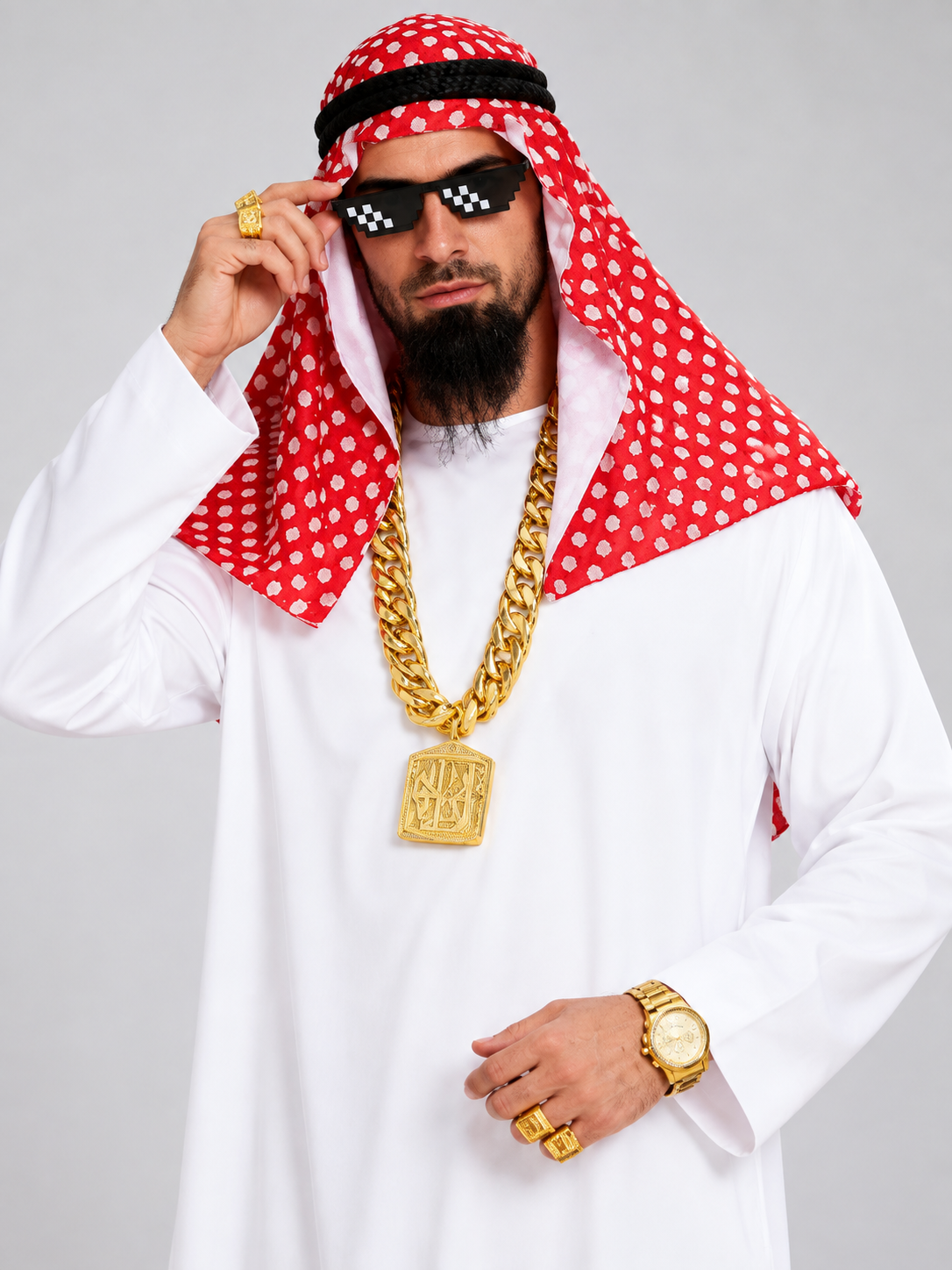 White clothing set with red scarf and chain