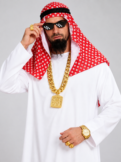 White clothing set with red scarf and chain