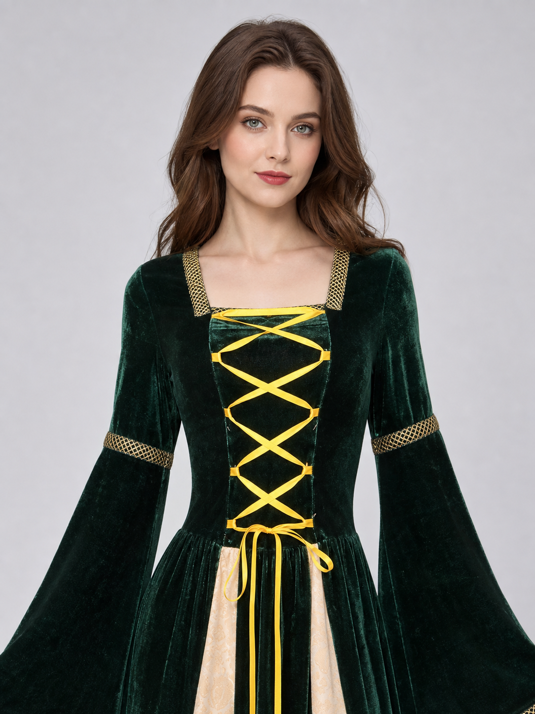 Long Gothic court-style costume dress with flared sleeves and skirt. The design combines deep green, black, cream, and gold tones. The upper section features decorative gold-tone crisscross lacing that accentuates the front. The cream inser