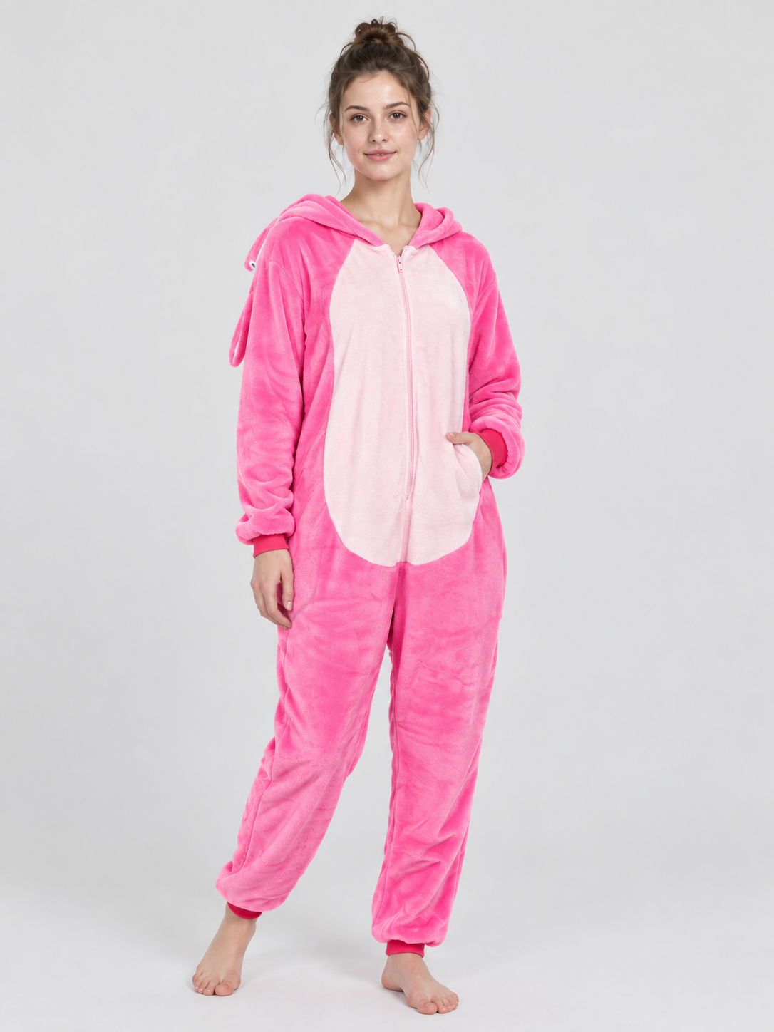 Pink pajama jumpsuit with hood, pocket, and zipper
