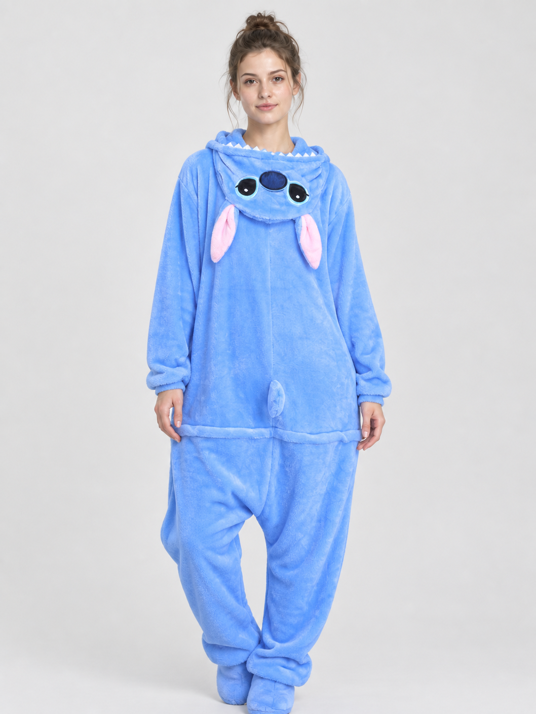 Blue pajama jumpsuit with a hood, ears, and tail