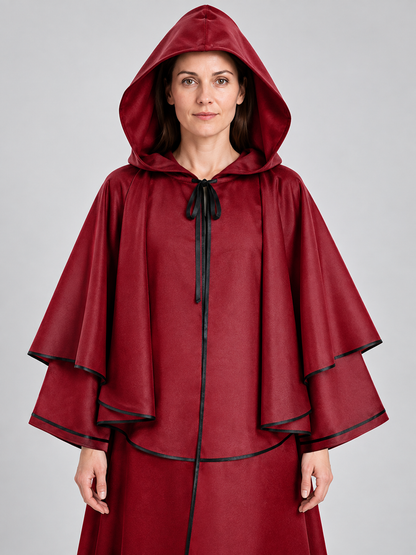 Long red hooded cloak with black trim