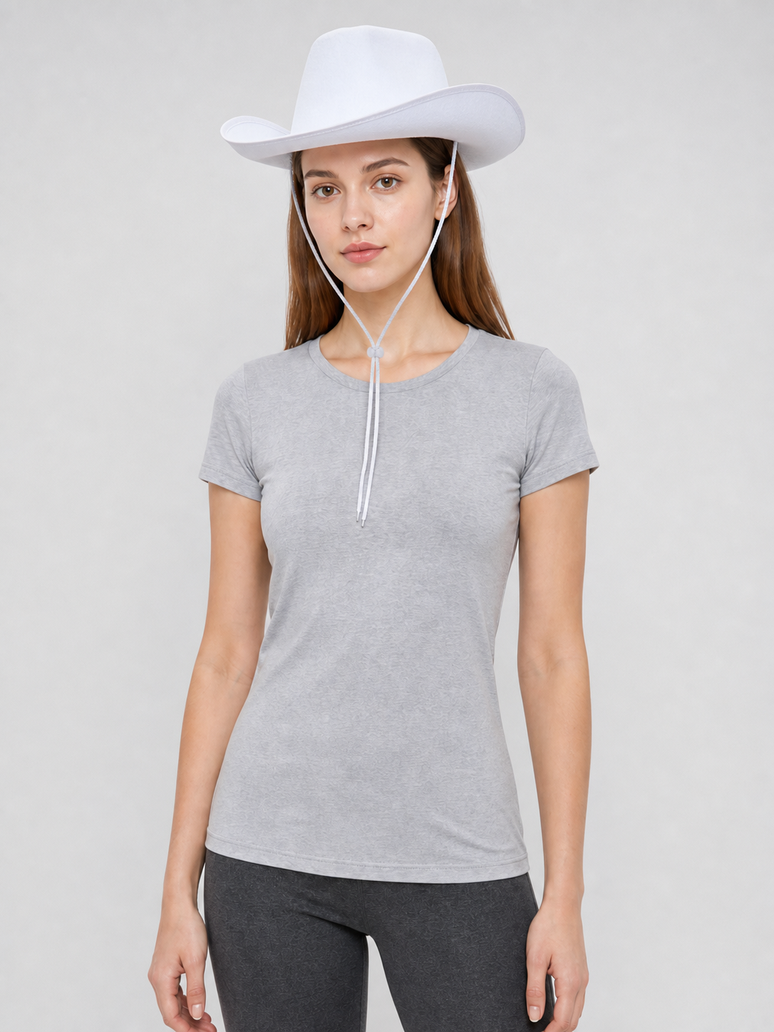 White Cowboy Hat with a Wide Brim and Chin Tie